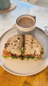 How to make the best bacon sandwich: Fry the delicious Tamworth back bacon until crispy. Toast two slices of fresh sourdough bread and spread with mayonnaise and mustard. Add a layer of fresh lettuce and a sliced tomato topped with salt. Finally, layer your delicious crispy bacon and the sourdough sandwich lid. Best enjoyed with a lovely hot cup of tea. 